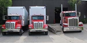 All three red trucks in Iowa location
